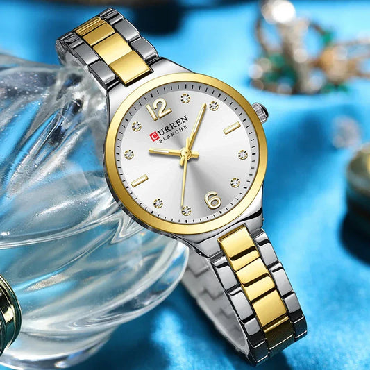 Women's stainless steel watch by Curren, model 9105, featuring a sleek design and silver-tone finish.