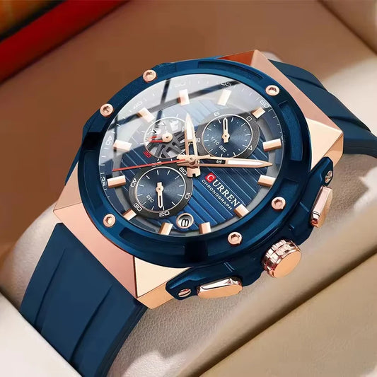 Blue Curren 8462 men's rubber strap watch showing a round dial with silver accents and a modern sporty design.