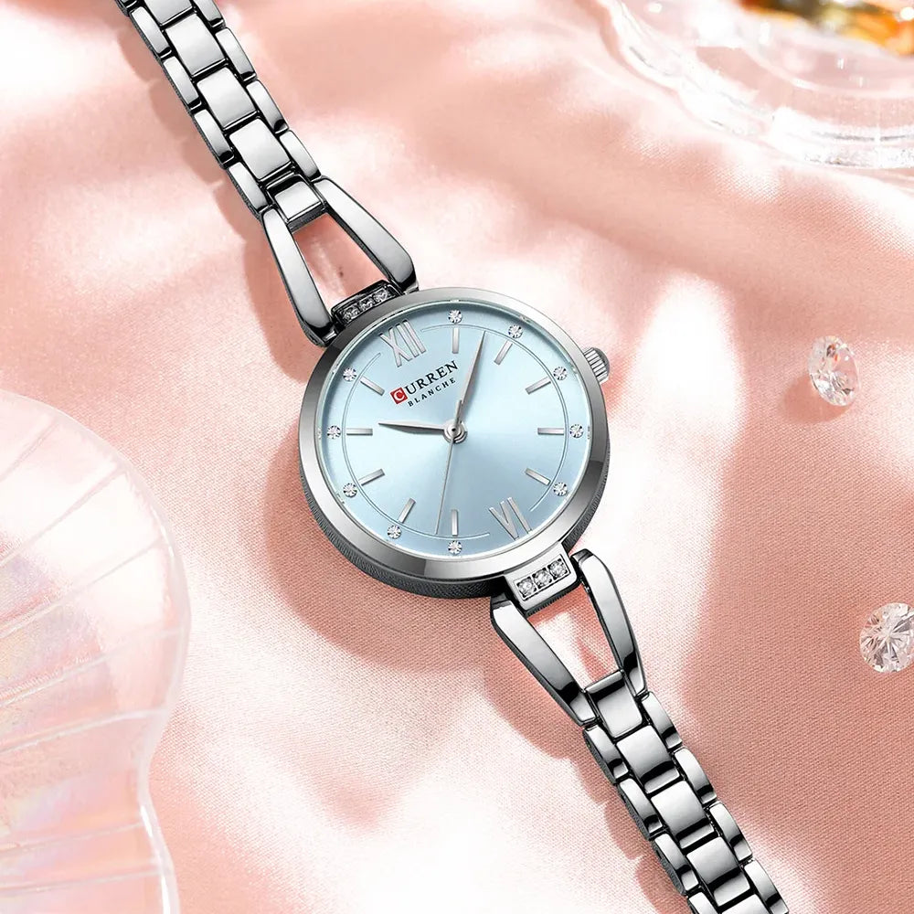 Curren 9092 elegant stainless steel ladies watch with light blue dial and silver band, stylish women’s wristwatch.
