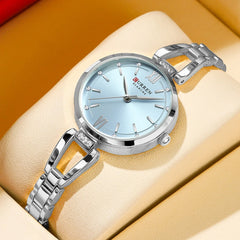 Curren 9092 elegant stainless steel ladies watch with a light blue dial and silver band, stylish women’s wristwatch.