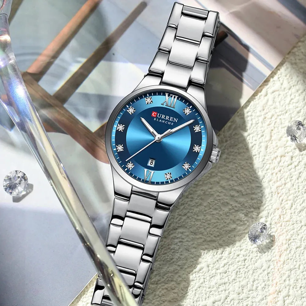 Curren 9107 ladies' quartz fashion watch with white dial and stainless steel band, showcasing elegant luxury design.
