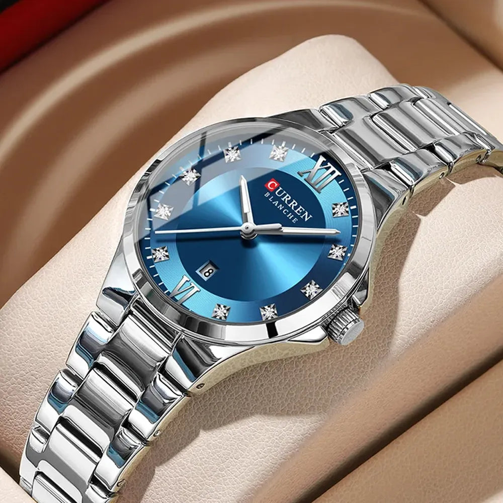 Silver and blue Curren 9107 ladies' quartz fashion watch with stainless steel band and elegant design.