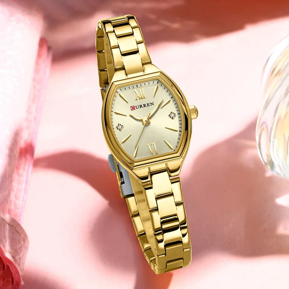 Silver and white Curren 9112 luxury quartz women's stainless steel watch with a sleek design and silver-tone finish.