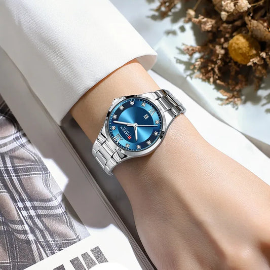 Silver and blue Curren 9107 women's quartz fashion watch with stainless steel band and elegant design.