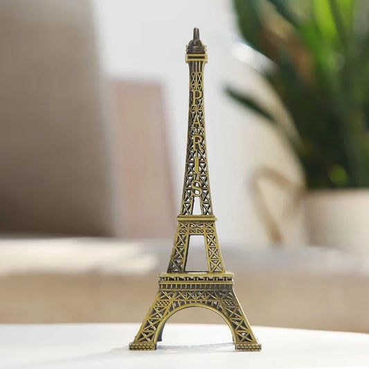 Metal Eiffel Tower showpiece by Tarjah Mart, decorative home decor sculpture featuring intricate details and a classic design.