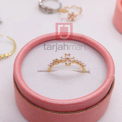 Women's trendy finger ring with stone from Tarjah Mart, showcasing a stylish design with a sparkling central gemstone.