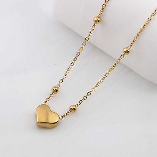 Stainless steel heart necklace from Tarjah Mart featuring a polished heart pendant on a sleek chain.