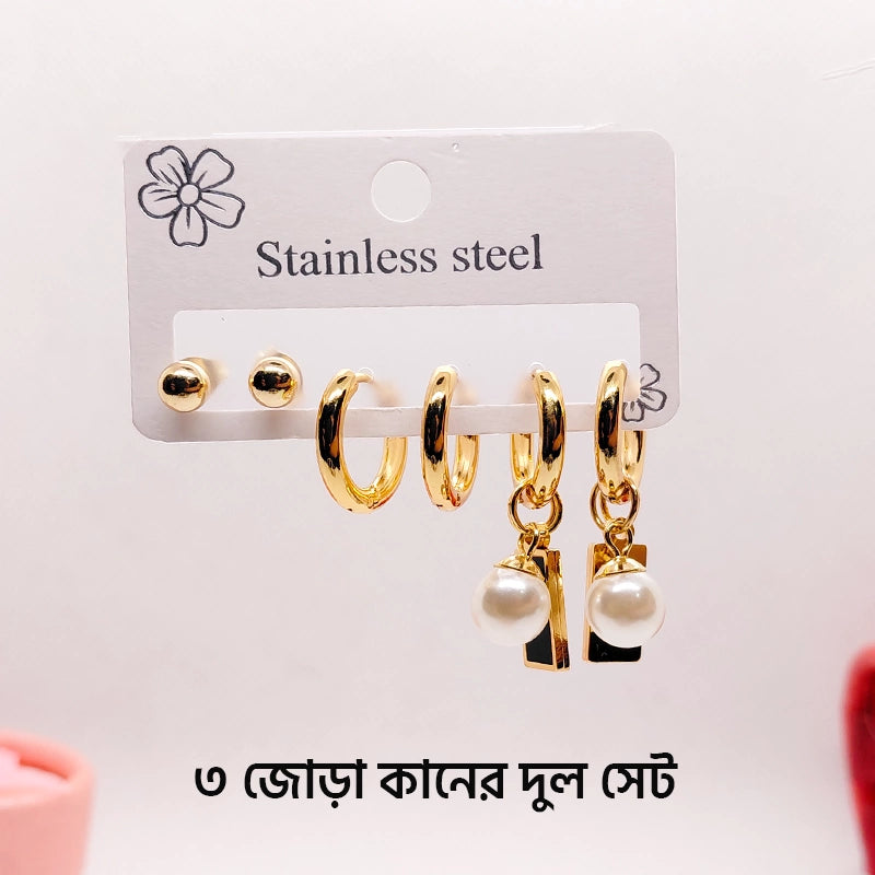 Set of three Tarjah Mart earrings featuring various styles, displayed on a neutral background.