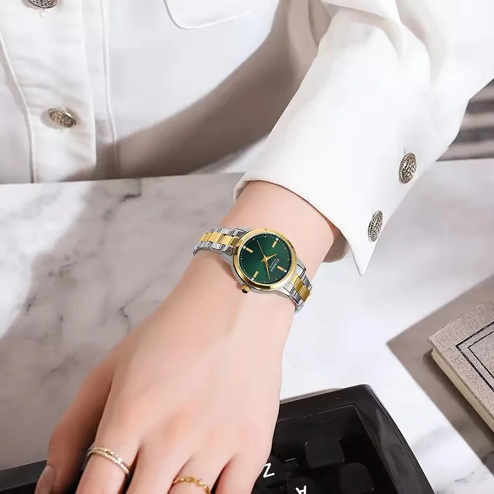Curren 9094 women's luxury stainless steel watch with green and gold accents, showcasing a stylish and elegant women’s timepiece.