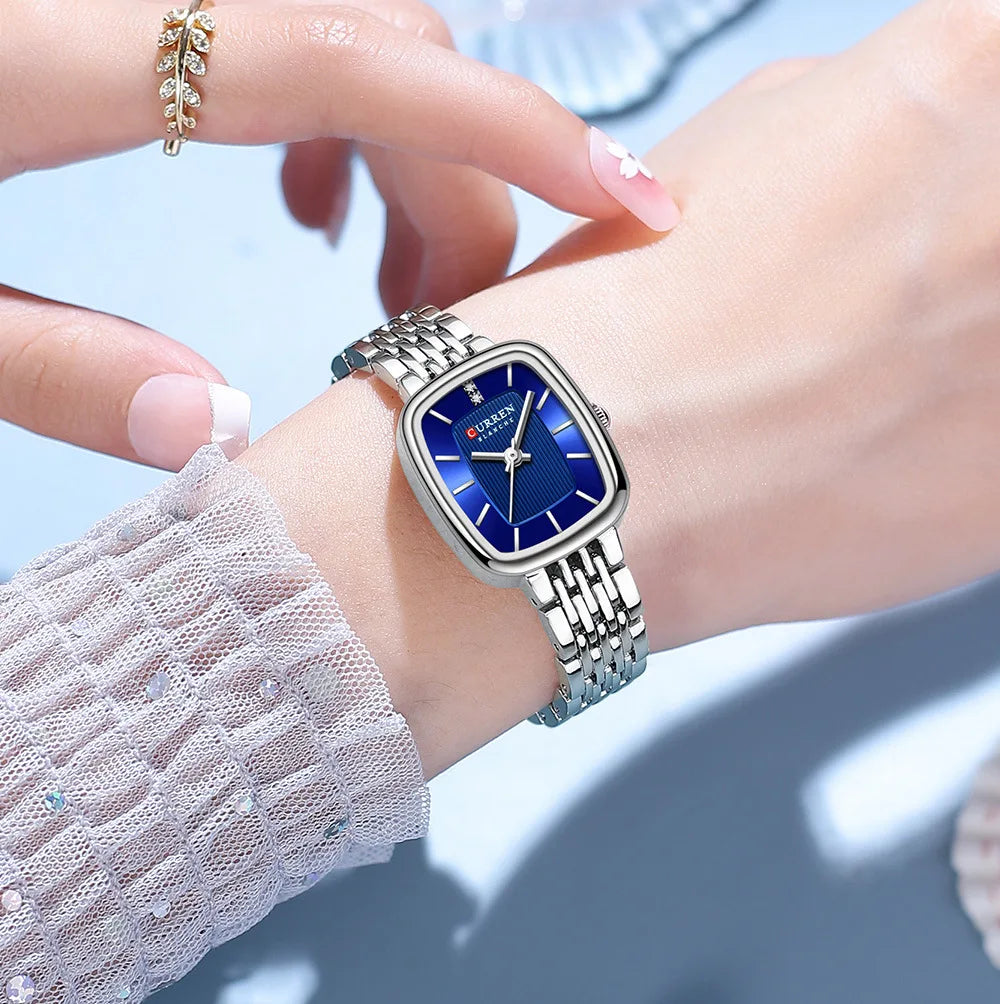 Golden Curren 9093 women's fashion quartz watch with a sleek design and round dial, perfect for stylish everyday wear.