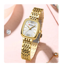 Silver and blue Curren 9093 women's fashion quartz watch with a sleek design and stainless steel band.