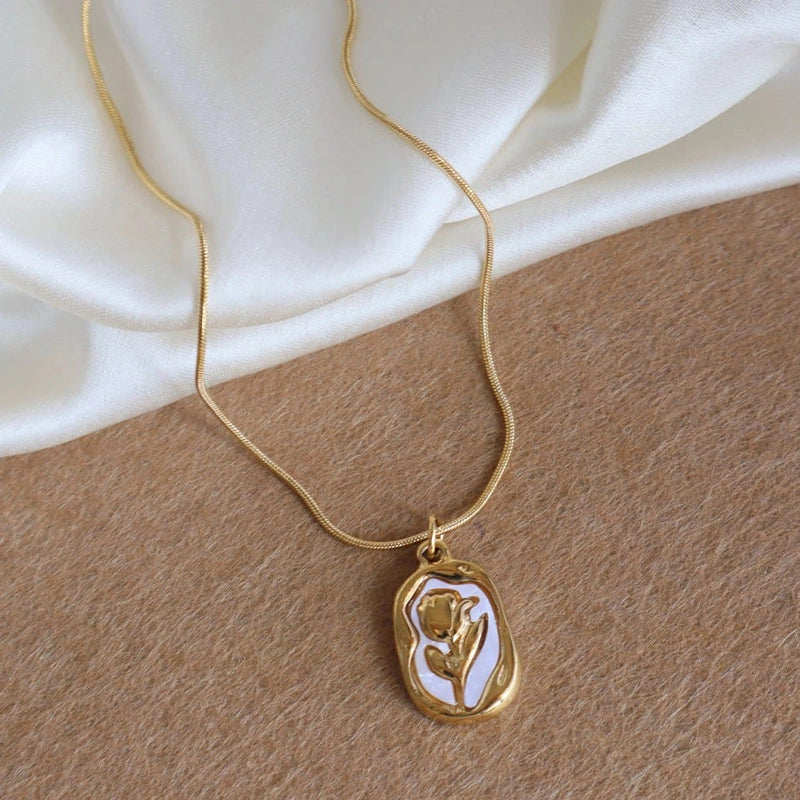 Geometric rose pendant necklace for women by Tarjah Mart featuring a stylish rose-shaped charm on a delicate chain