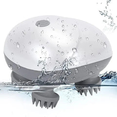 Tarjah Mart electric scalp massager OSK-701 with ergonomic design, black handheld device for relaxing electronic scalp massage.