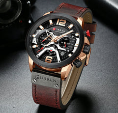 Men's leather strap watch by Curren, featuring a round dial and classic design with black leather strap and silver case.