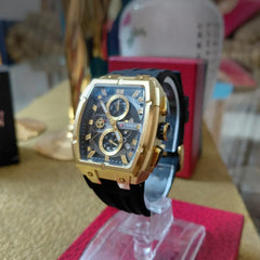 Curren 8488 men's watch with a black silicon strap and multifunctional dial, featuring a sleek, sporty design.