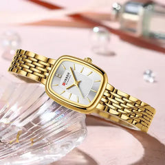 Golden Curren 9093 women's fashion quartz watch with a white dial and gold-tone bracelet, stylish and elegant accessory.