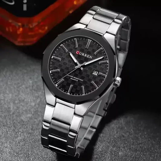 Silver and black Curren 8477 men's quartz watch with a sleek design and round dial, showcasing a stylish men's wristwatch.
