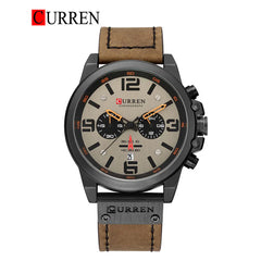 Curren 8314 men's leather strap watch showing a sleek black dial and classic leather band on a wrist.