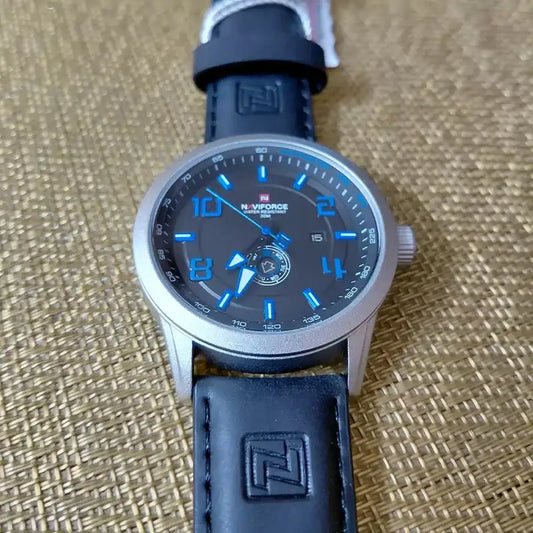 Naviforce NF9229 youth retro men's watch with black dial, silver case, and leather strap, showcasing stylish and vintage design.