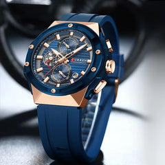 Curren 8462 men's watch with a blue rubber strap, round dial, and silver-tone case, featuring a stylish and modern design