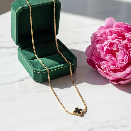 Elegant women’s luxury necklace by Tarjah Mart featuring intricate design and sparkling accents on a delicate chain.