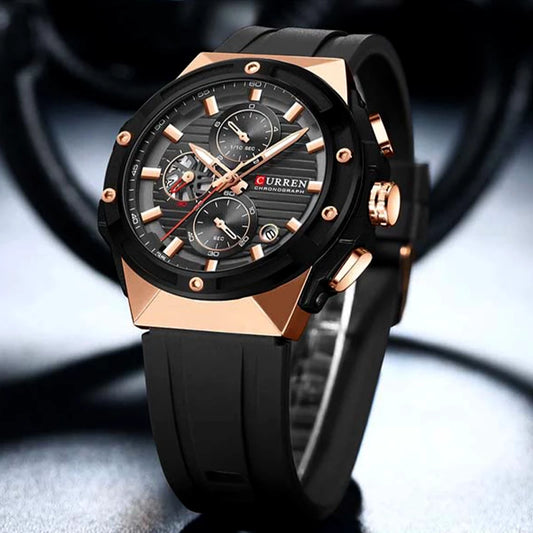 Curren 8462 men's black rubber strap watch showing a black dial with silver accents and a sleek, modern design.